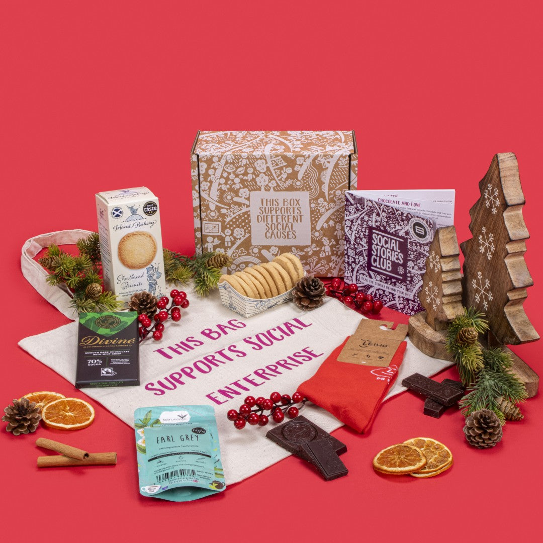 Get Well Soon Gift Box open, revealing Earl Grey tea twin pack, shortbread biscuits, mint crisp dark chocolate, natural cotton tote bag, bamboo socks, story booklet, and personalised note in soft, caring sustainable packaging with gentle recovery motifs.