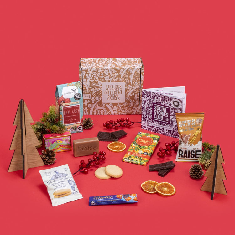 Happy Birthday Gift Box open, displaying Earl Grey tea, twin-pack shortbread, sea salt caramel chocolate, organic soap, salted caramel milk chocolate, salted caramel seeds and nuts, story booklet & personalised note in celebratory sustainable packaging with birthday accents.