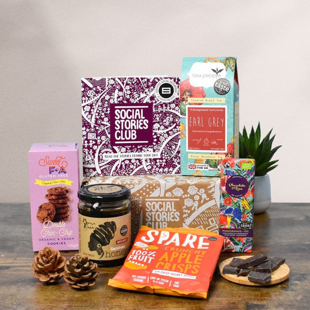 Sweet Treats Gift Box - Made without Gluten. This image shows a sustainable gift box surrounded by social enterprise products chosen for those who don’t like gluten and who love sustainability.