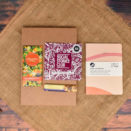 Journaling Letterbox Gift featuring an A5 journal and ethical chocolate, all supporting global education and social causes.